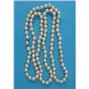 Image 1 : A single row necklace, of uniform cultured pearls with pearl clasp, 38ins...
