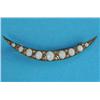 Image 1 : A Victorian gold open crescent brooch, set 9 graduated oval opals and diamond chips...