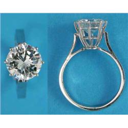 A solitaire diamond ring, the round brilliant cut stone claw-set in 18ct white gold, weight estim...
