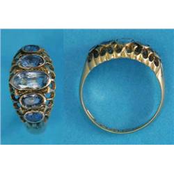 An Edwardian 18ct gold 5-stone sapphire half hoop ring....