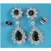 Image 1 : A pair of sapphire and diamond pendant earrings, each with a pear shaped sapphire bordered by 12...