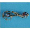 Image 1 : An Edwardian gold love token brooch, designed as a question mark set with cabochon sapphire, ruby...