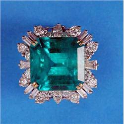 An important emerald and diamond ring, the square-cut emerald within a shaped border of marquise,...