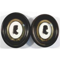 John Miers (1758-1821) pair of painted plaster silhouettes, M.R.Wall, aetat 12, and C.E.W aetat 9...