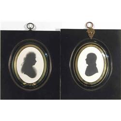 John Miers (1758-1820) two painted plaster silhouettes, Profiles of a Lady and a young man, Trade...