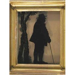 Manner of Charles Rosenberg silhouette painted on glass, Gentleman standing beside tree trunks, 6...