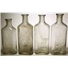 Image 1 : Four N. E . Wilson Co. Bottles