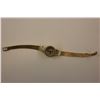 Image 1 : LADIES 14K YELLOW GOLD AND DIAMOND BULOVA ACCUTRON QUARTZ WRIST WATCH, MODEL #114804, CLAW SET