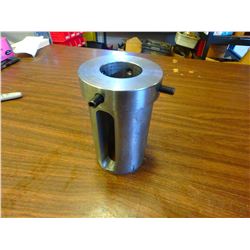 3.5" O.D., 2" I.D. Bushing, No info on unit