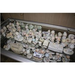 LARGE SHELF LOT OF ASSORTED ENESCO PRECIOUS MOMENTS COLLECTABLE FIGURINES