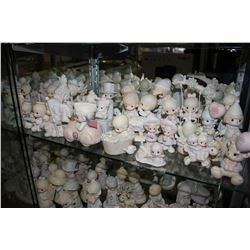 LARGE SHELF LOT OF ASSORTED ENESCO PRECIOUS MOMENTS COLLECTABLE FIGURINES