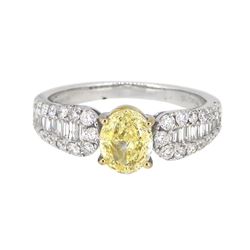 18KT White Gold 1.01ct Fancy Yellow Diamond Ring