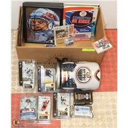 BOX OF ASSORTED HOCKEY MEMORABILIA INCL OILER BEER
