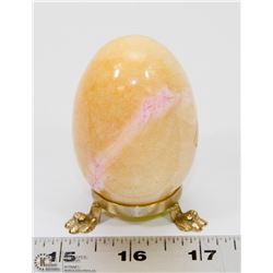 EGG SHAPED STONE ON STAND