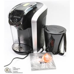 KEURIG WITH COFFEE POT, MANUAL, WARRANTY AND