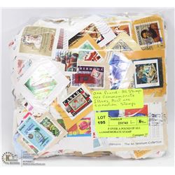 BAG OF OVER A POUND OF ALL COMMEMORATE STAMP