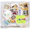 Image 1 : BAG OF OVER A POUND OF ALL COMMEMORATE STAMP