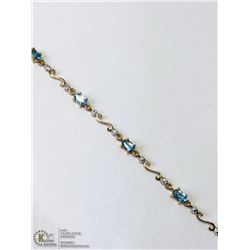 21) 10KT GOLD BLUE TOPAZ DIAMOND BRACELET