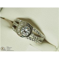 43) STERLING SILVER CUBIC ZIRCONIA RING SIZE 7