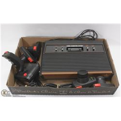 ATARI GAME SYSTEM W/ 2 SETS OF PADDLE CONTROLLERS