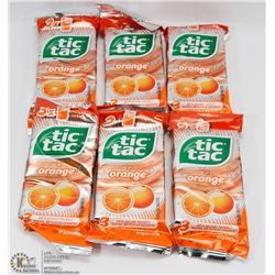 6 PACKS OF 3 ORANGE TIC TACS.