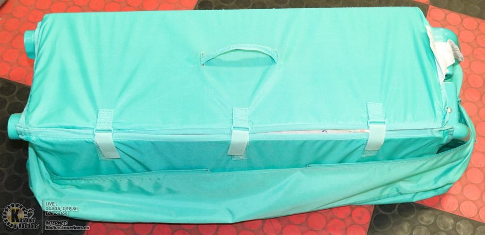 evenflo happy camper bassinet