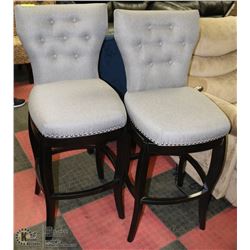 PAIR OF GREY FABRIC SWIVEL BAR STOOLS