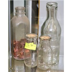 COLLECTION OF MILK BOTTLES.