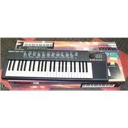 YAMAHA PORTATONE ELECTRIC KEYBOARD