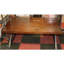 WOOD TONE AND METAL COFFEE TABLE DAMAGED AS IS