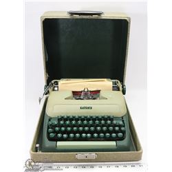 VINTAGE EATONS TYPEWRITER WITH  ORIGINAL HARD CASE