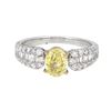 18KT White Gold 1.01ct Fancy Yellow Diamond Ring