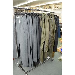 Dealer's lot brand new rain gear etc. Dealer's lot of brand new clothing including wool pants and ra