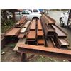 Image 1 : LARGE QUANTITY OF STEEL BEAMS AND STOCK IN FRONT OF AND ON RACK