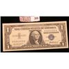 Image 1 : Series 1957 $1 Silver Certificate, AU.