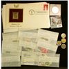 Image 1 : 1022 _ Collection of Stamps and a few coins and tokens.  The Stamps include a 22K Gold Replica Stamp