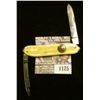 Image 1 : 1125 _ Western Two-blade Folder Knife with 2 1/4" blades, yellow mother-of-pearl handle, brass inlay