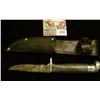 Image 1 : 1127 _ Western Sheath Knife with sheath & 3 1/4" blade, banded black with silver-colored bands and a