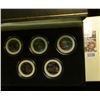 Image 1 : 1170 _ 2000 Colorized Statehood Five-Piece Quarter Set in a fancy holder and special box. Each coin 
