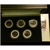 Image 1 : 1175 _ 2005 Colorized Statehood Five-Piece Quarter Set in a fancy holder and special box. Each coin 
