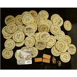 1255 _ (59) "Quasquicentennial/1857-1982/125 Yrs./Coggon, Iowa" Wooden Nickels; (3) "Ladams" adverti