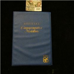 1527 _ Expo 86 Four-piece Commemorative Medalion Set including "Expo Centre", "Expo Ernie", "B.C. Pa