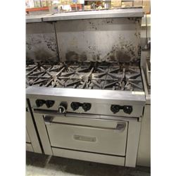6 BURNER GARLAND STOVE WITH SHELF AND 8 WHEELS