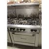 Image 1 : 6 BURNER GARLAND STOVE WITH SHELF AND 8 WHEELS