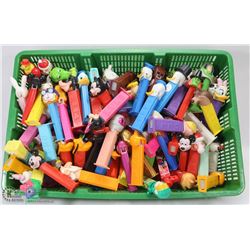 BASKET OF 125+ VINTAGE PEZ DISPENSERS