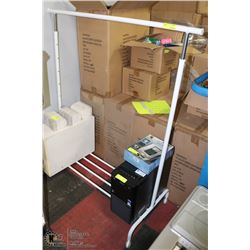 CLOTHES RACK ON WHEELS. FURNITURE