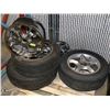 Image 1 : 4 CHROME RIMS 5 BOLT, WITH EXTRA TIRE ON RIM