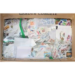 BOX OF ASSORTED COLLECTIBLE STAMPS.