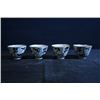 A set of blue-and-white small bowls, four bowls