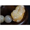 Image 3 : A Jadeite Bead Bracelet(Shou chuan) with one of the beads cut in a Pixiu Shape